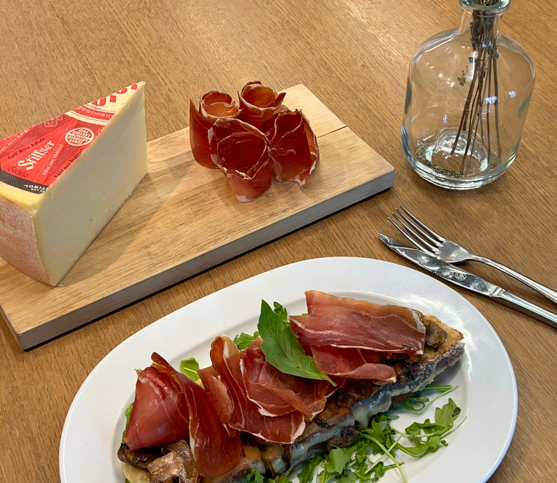 Speck Alto Adige IGP et Fromage Stelvio AOP : l’authenticité des cimes de l'Europe chez vous !